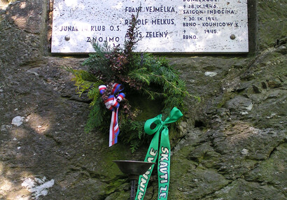 A memorial plaque on a rock at the entrance to the castle commemorates the Nový Hrádek scouts who fell in the Second World War.